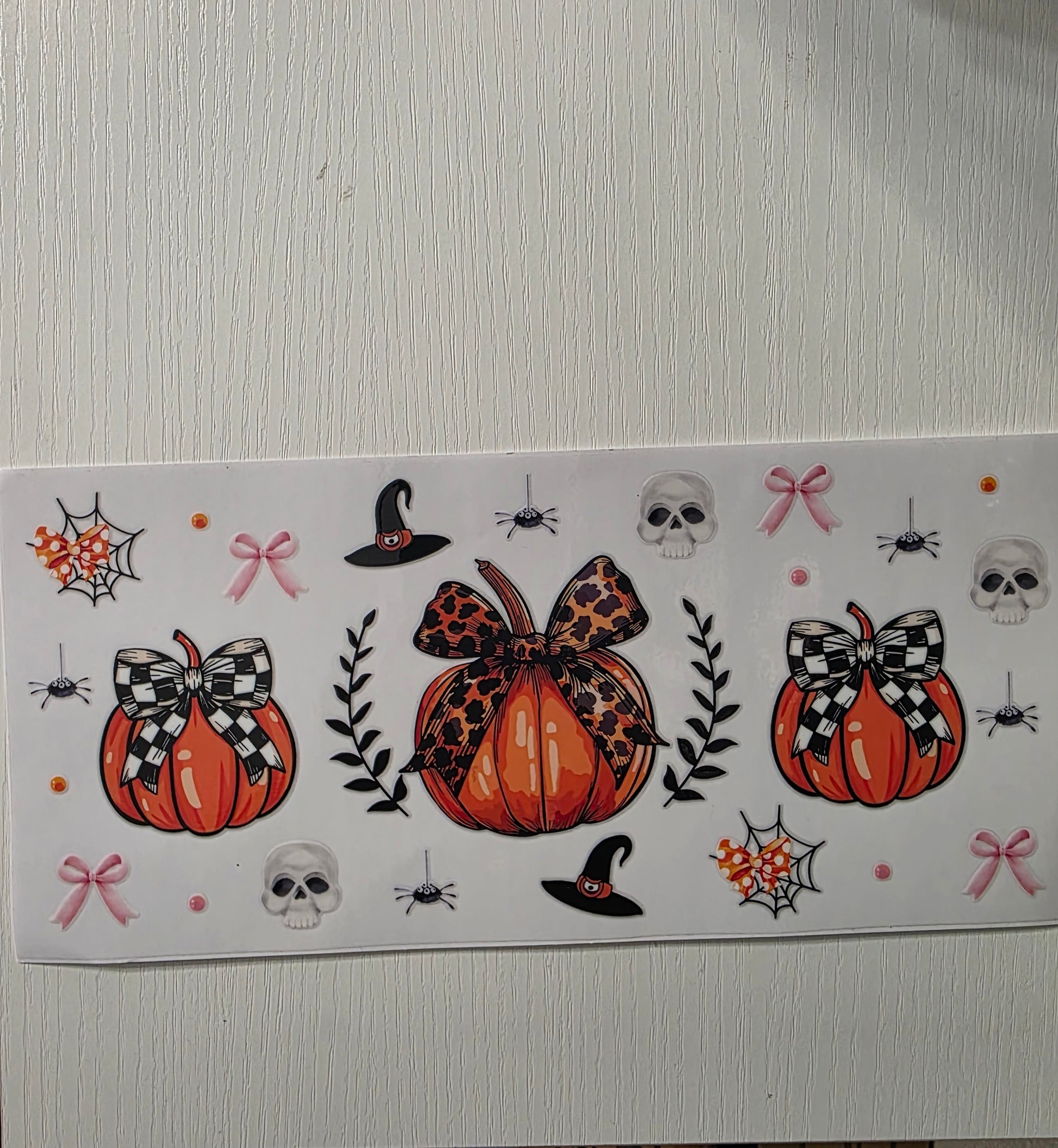 Checkered bows on pumpkins