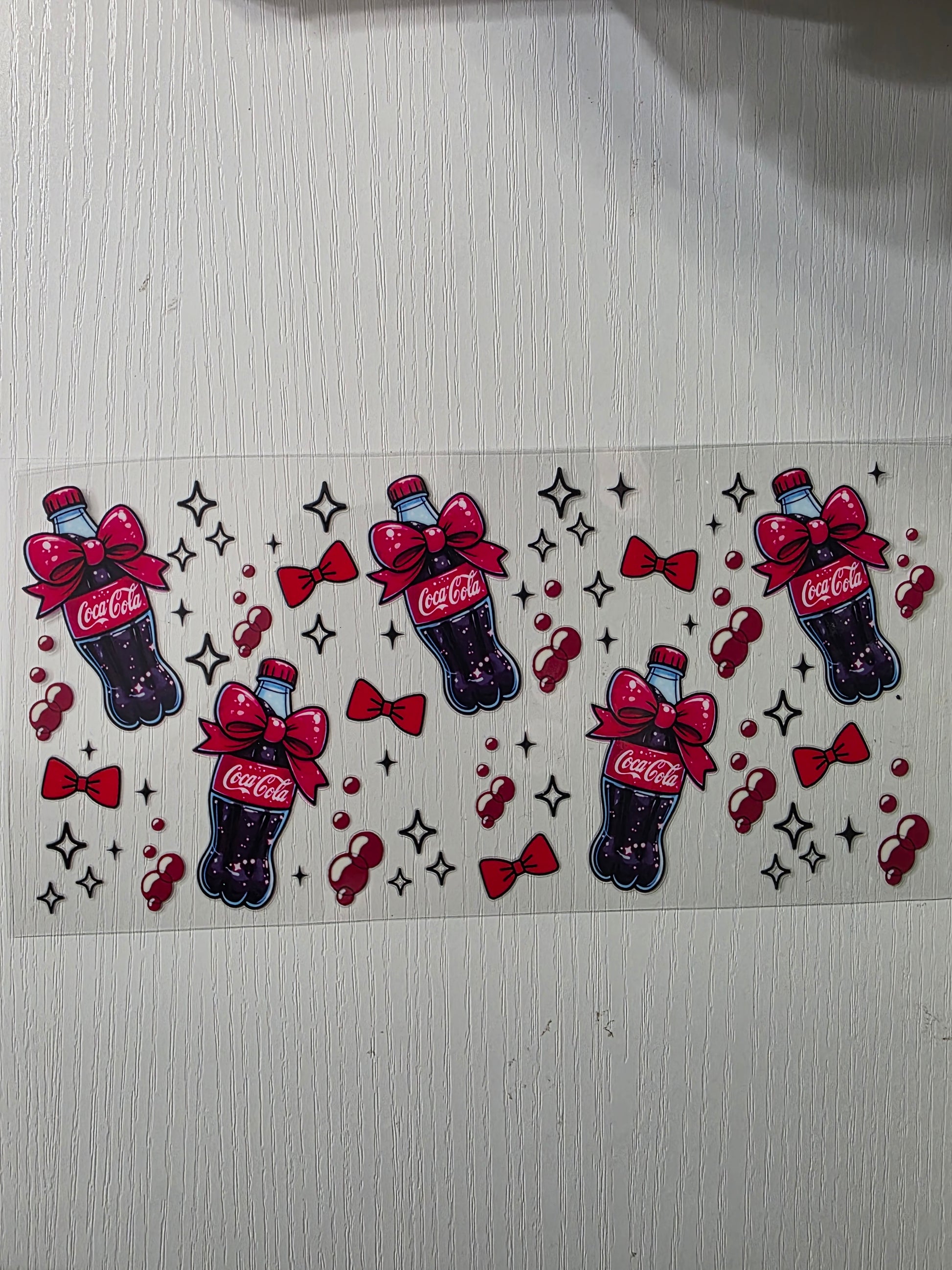 Coke cola bottles and red bowties