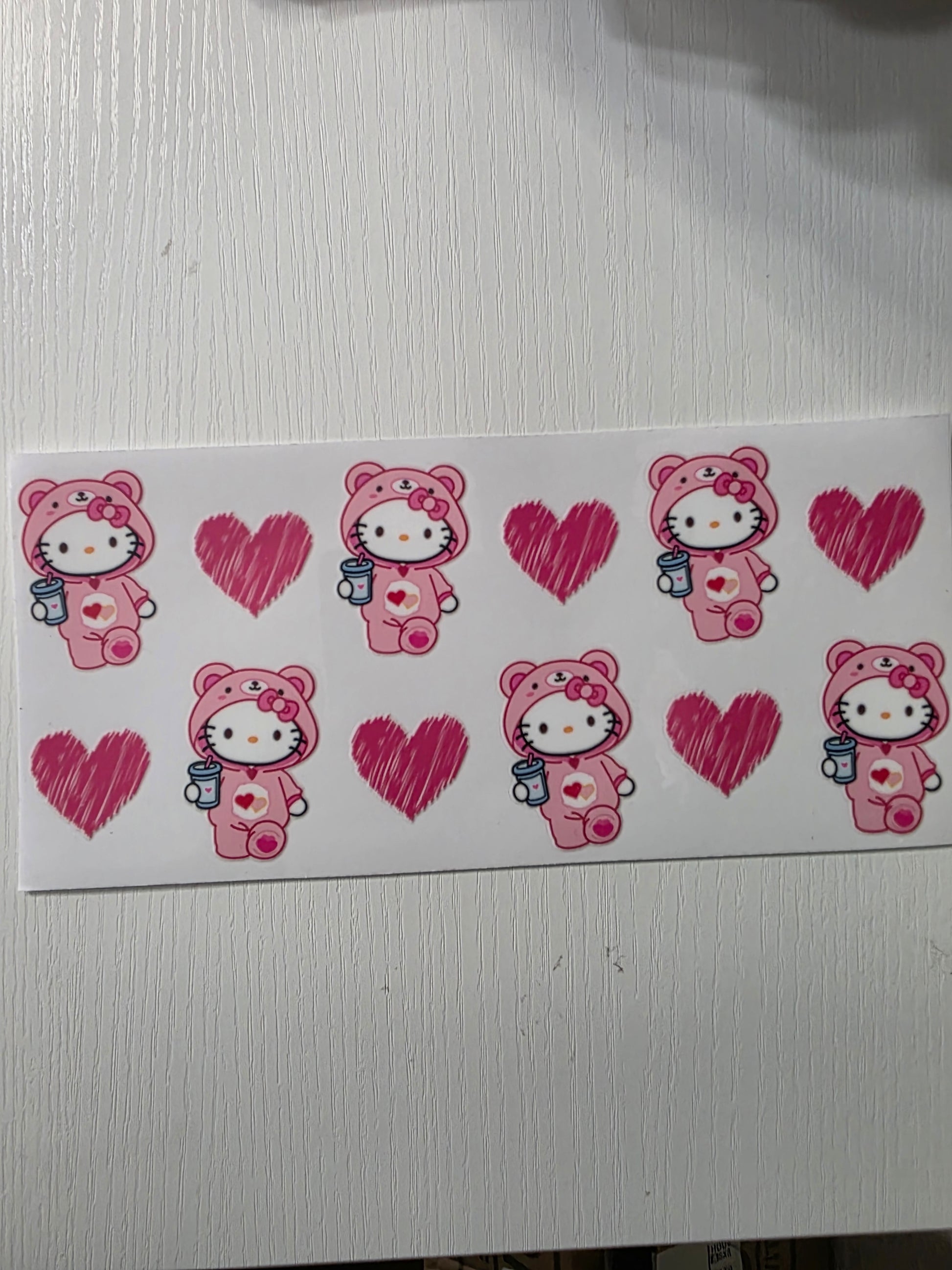 Hello kitty in bear jumpsuit