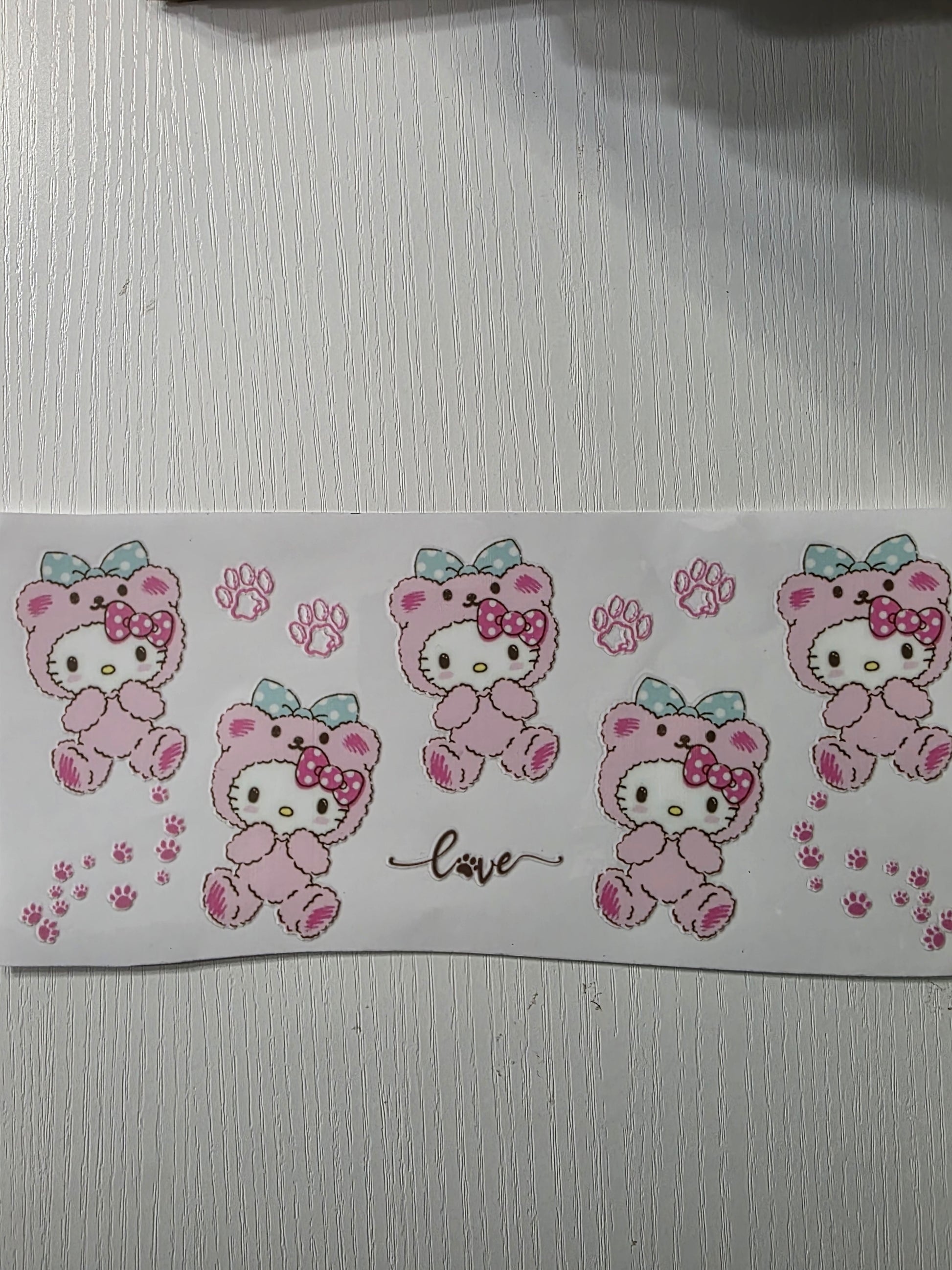 Hello kitty & paw prints