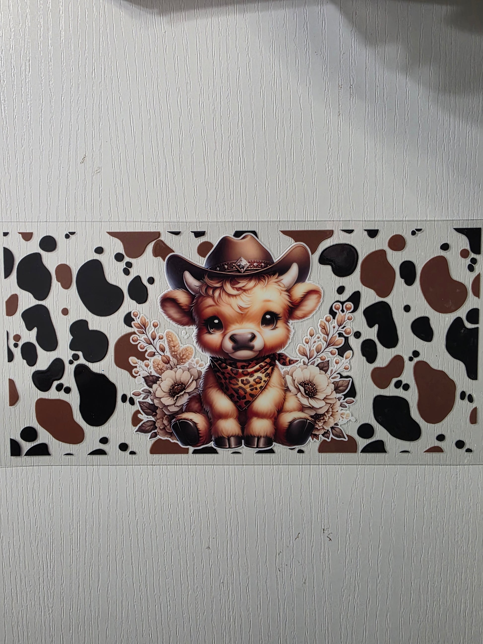Brown & black printe cowboy cow