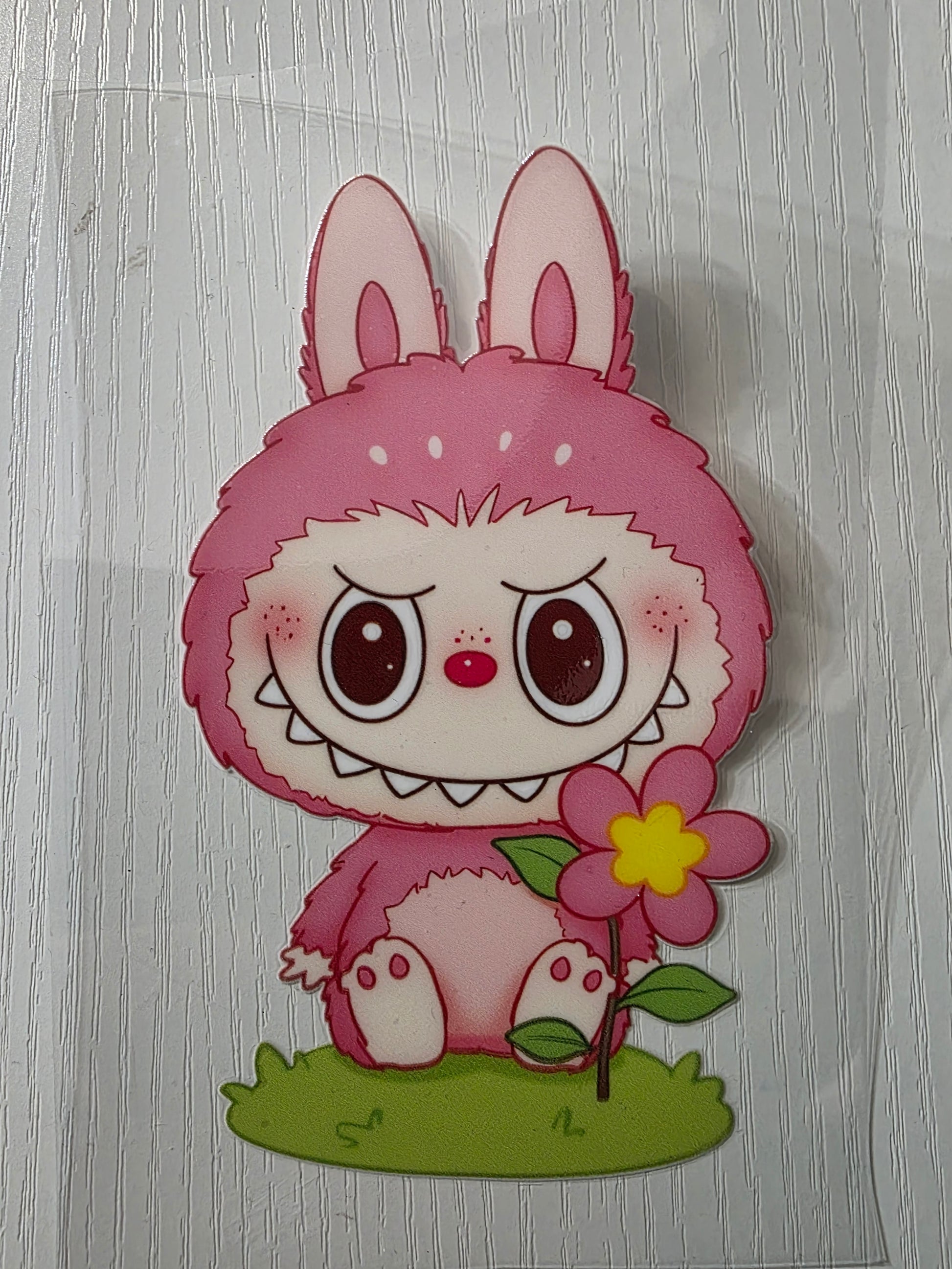 Pink labubu with pink flower